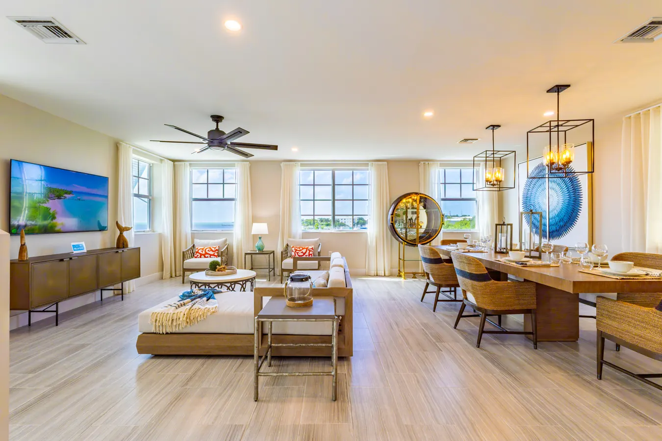 Open living and dining room in a furnished residence at Playa Largo Ocean Residences.